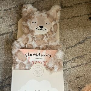 New in box lynx snuggler, and book and card